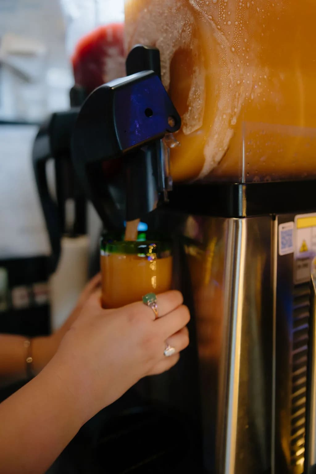 frozen-cocktail-pour-closeup-slush-machine.jpg
